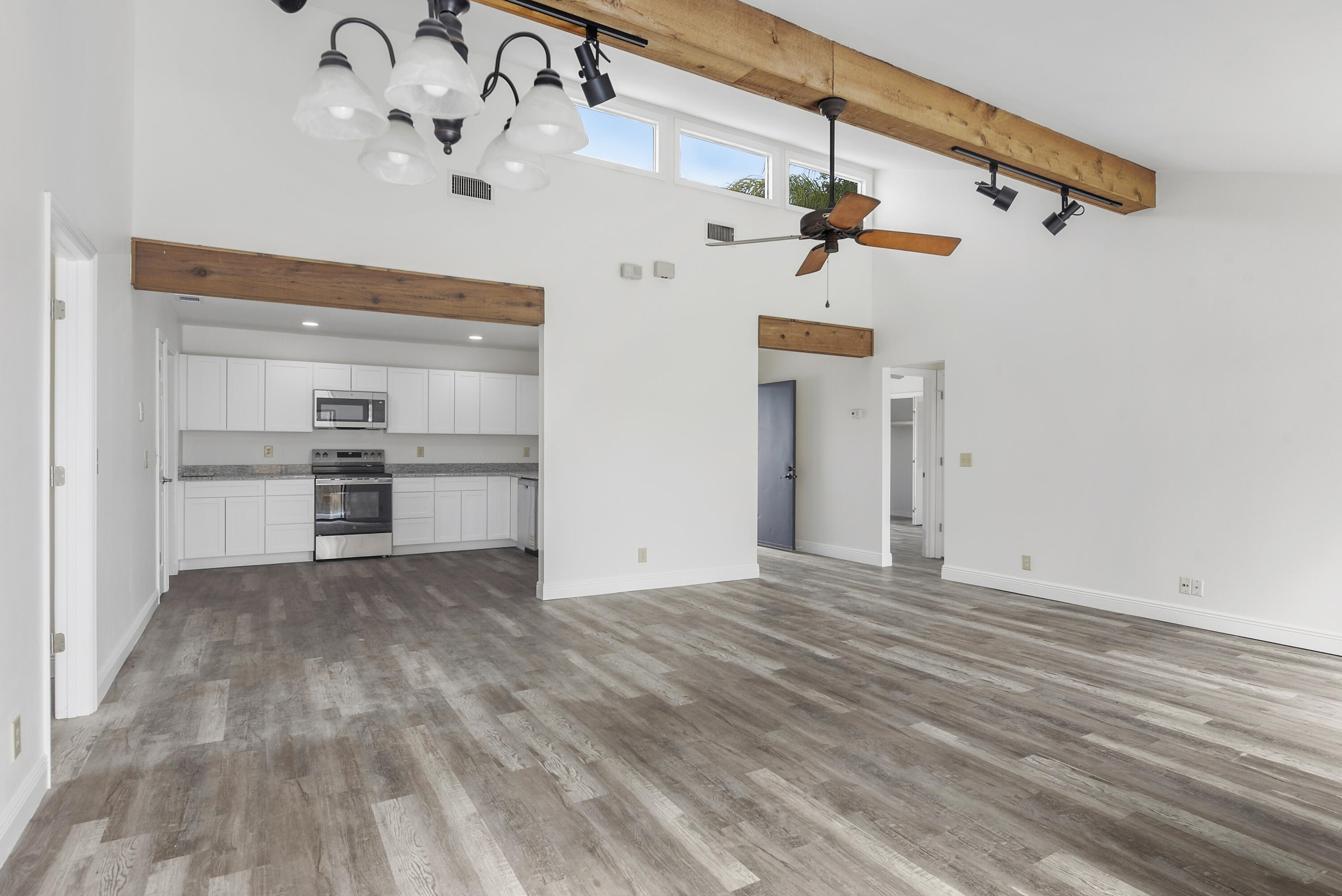5666 Southeast Matousek Street Stuart, FL 34997 - Photo 8 of 49 a view of a room with a ceiling fan