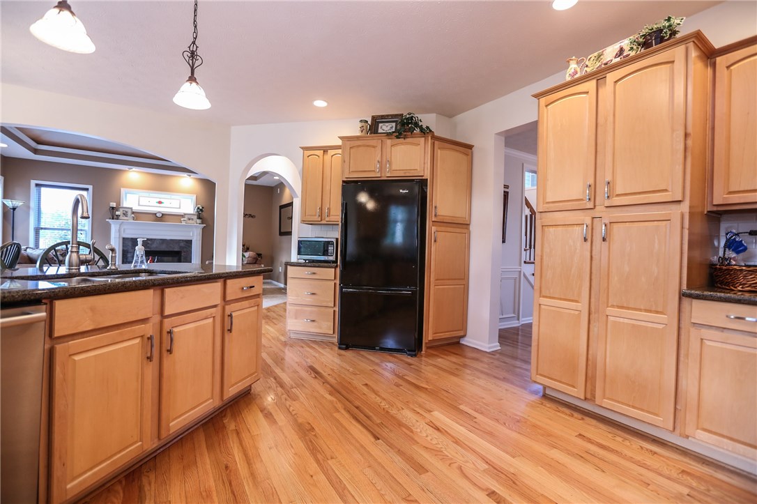 83 Angels Path Penfield, NY 14580 - Photo 17 of 36 Ample pantry storage and granite counters to compl