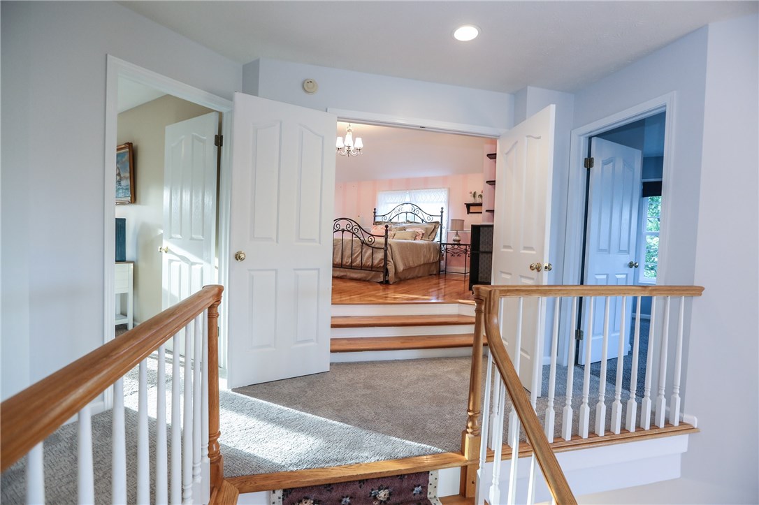 83 Angels Path Penfield, NY 14580 - Photo 20 of 36 Approaching the large landing to access 5 generous