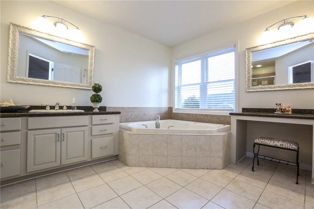 83 Angels Path Penfield, NY 14580 - Photo 23 of 36 Relax and revive in the fully tiled master bath wi