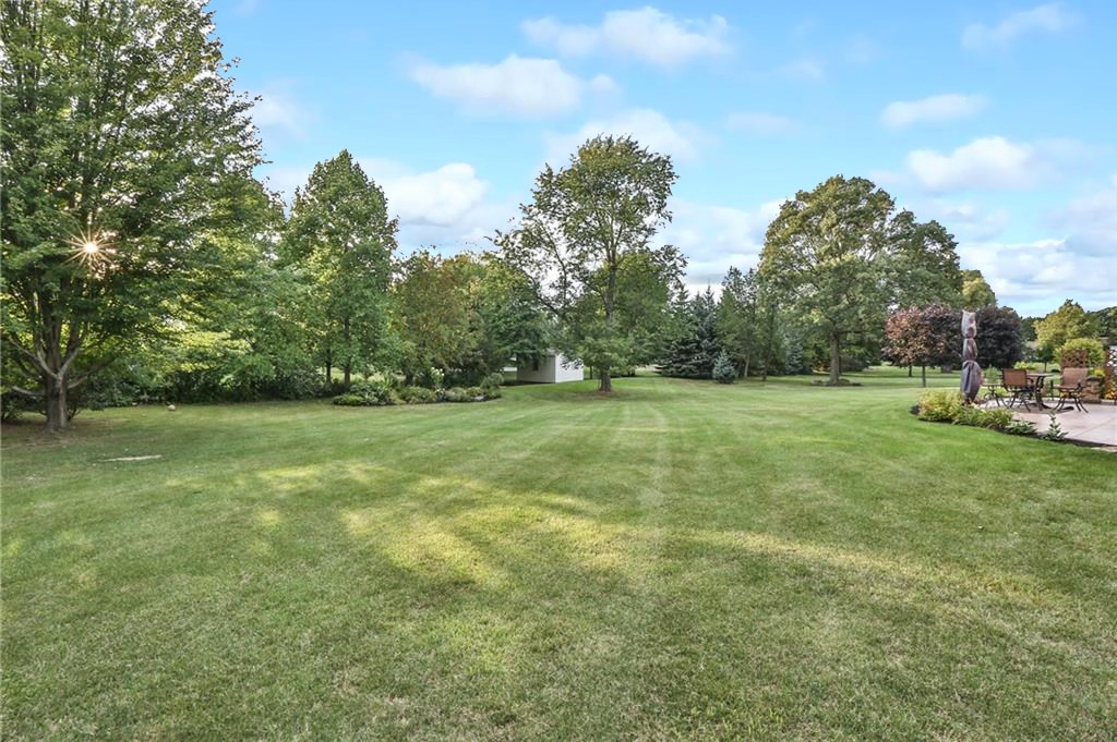 83 Angels Path Penfield, NY 14580 - Photo 35 of 36 The expansive private back yard is perfect for spo