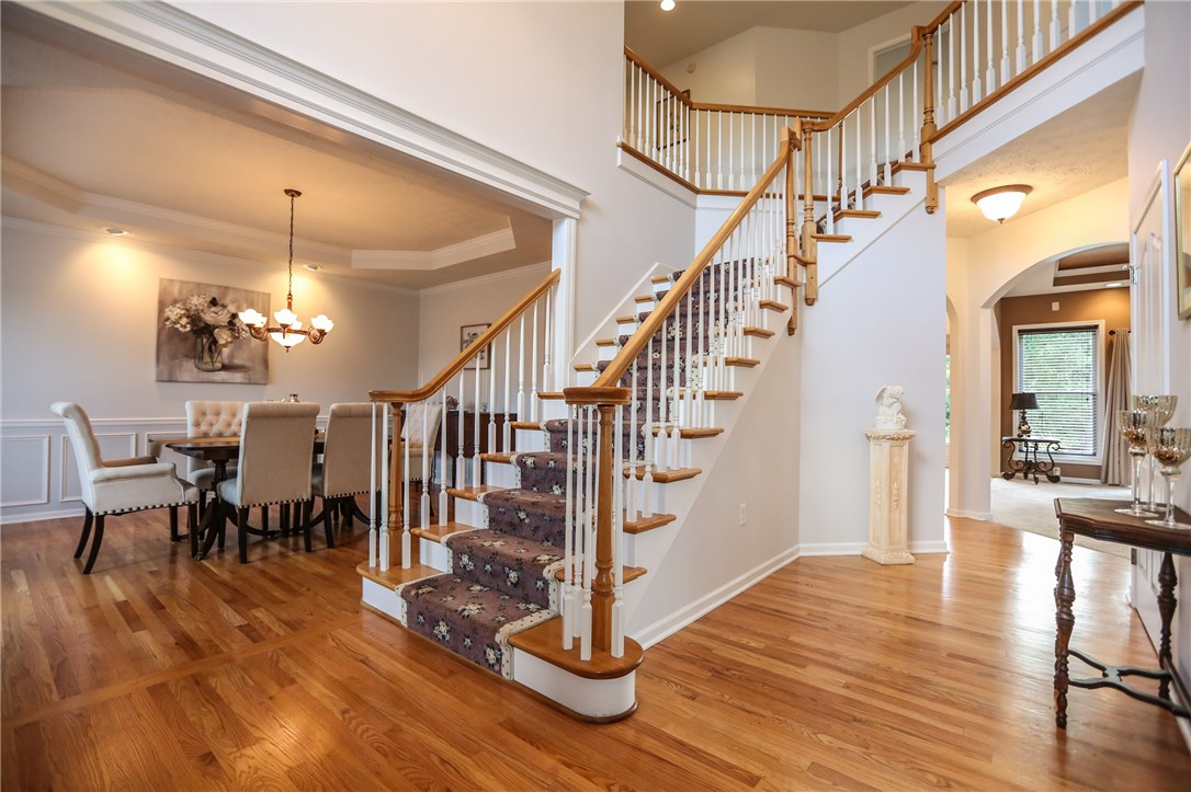 83 Angels Path Penfield, NY 14580 - Photo 5 of 36 A wonderfully spacious 2-story entry foyer warmed
