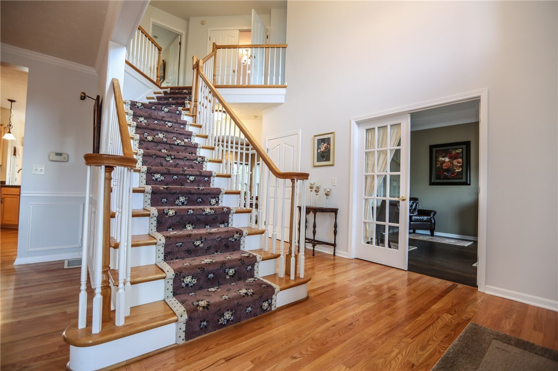 83 Angels Path Penfield, NY 14580 - Photo 8 of 36 Alternate view of the entry foyer looking toward t