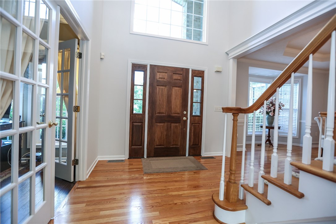 83 Angels Path Penfield, NY 14580 - Photo 9 of 36 Welcome visitors in a generous 2-story foyer with
