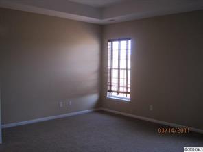 6308 Trotters Ridge Road Charlotte, NC 28227 - Photo 6 of 11 an empty room with a window