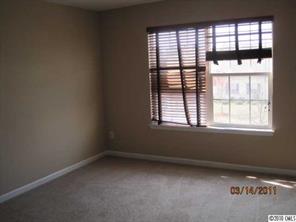 6308 Trotters Ridge Road Charlotte, NC 28227 - Photo 8 of 11 an empty room with a window