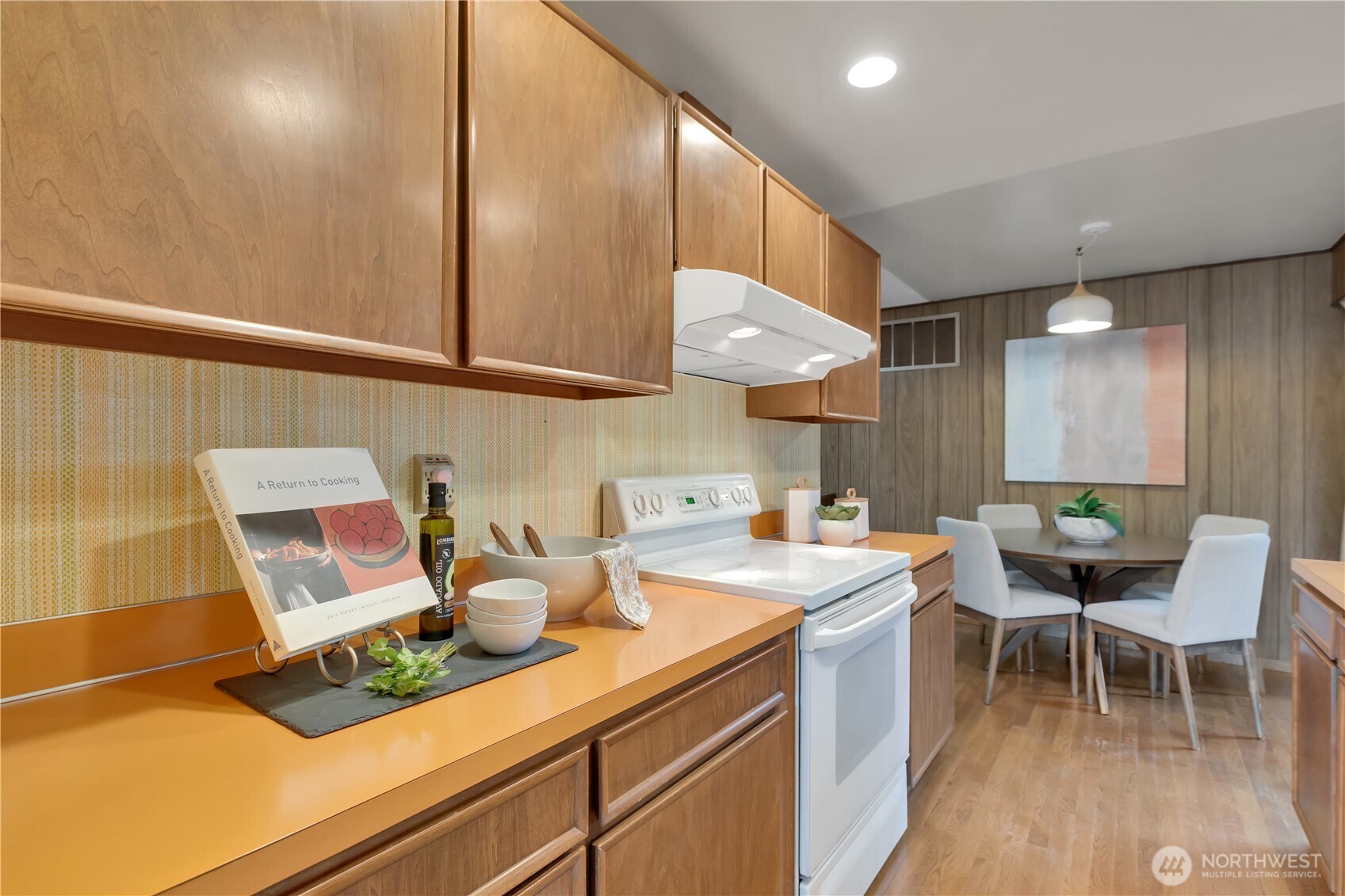 2005 Camas Court Southeast Renton, WA 98055 - Photo 11 of 31 a kitchen with a sink cabinets and wooden floor