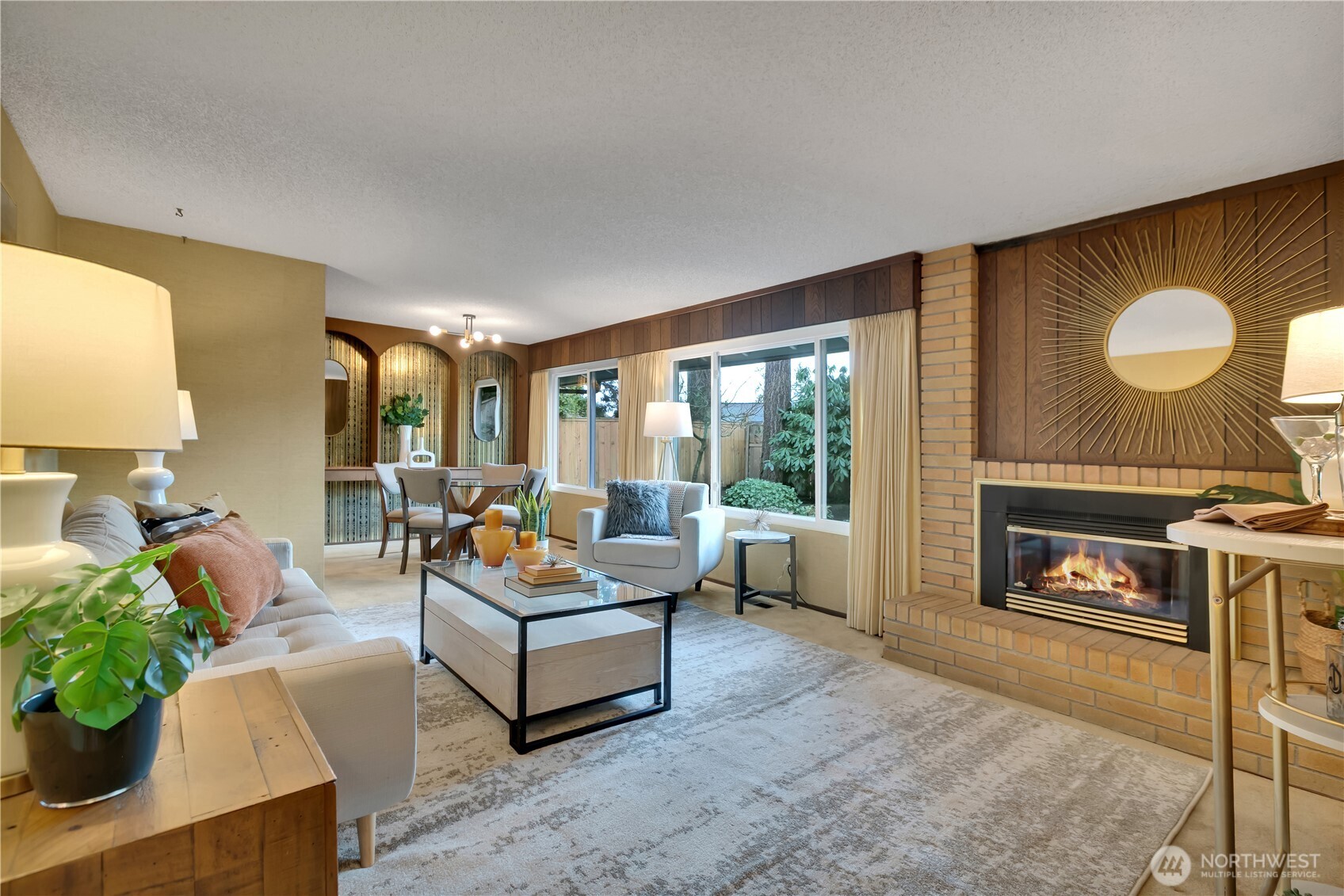 2005 Camas Court Southeast Renton, WA 98055 - Photo 15 of 31 a living room with furniture wooden floor and a fireplace