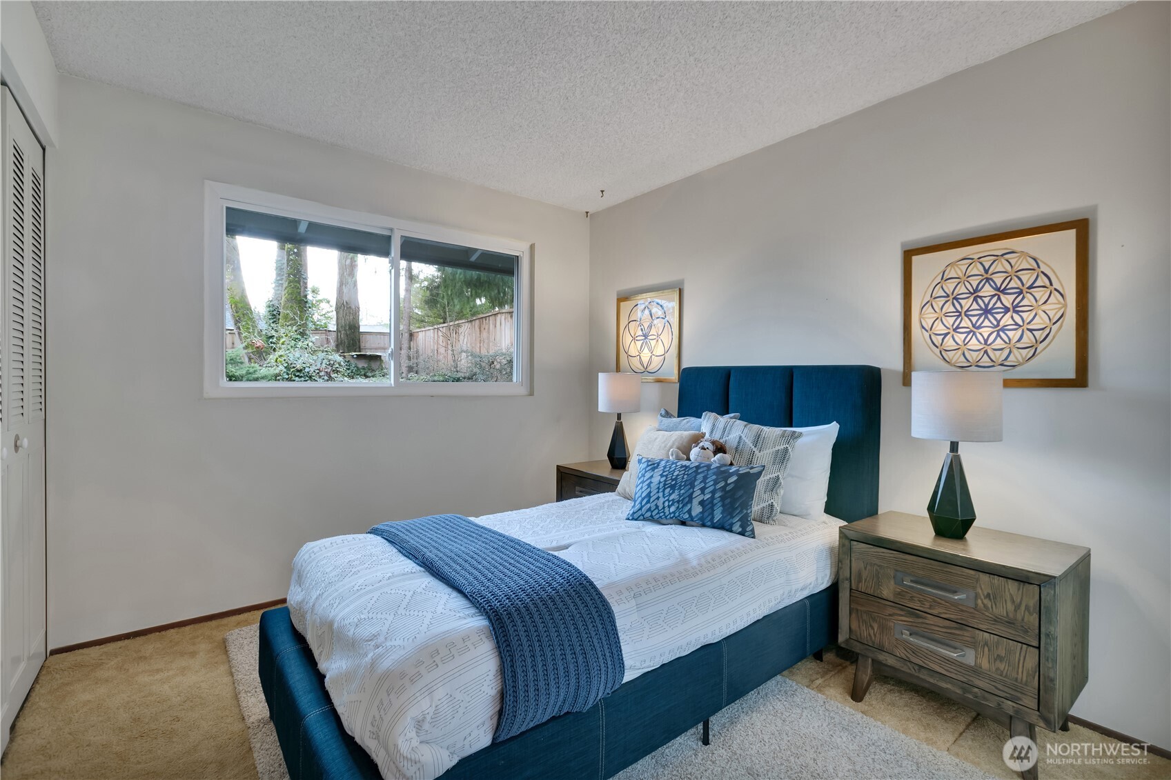 2005 Camas Court Southeast Renton, WA 98055 - Photo 22 of 31 a bedroom with bed and window