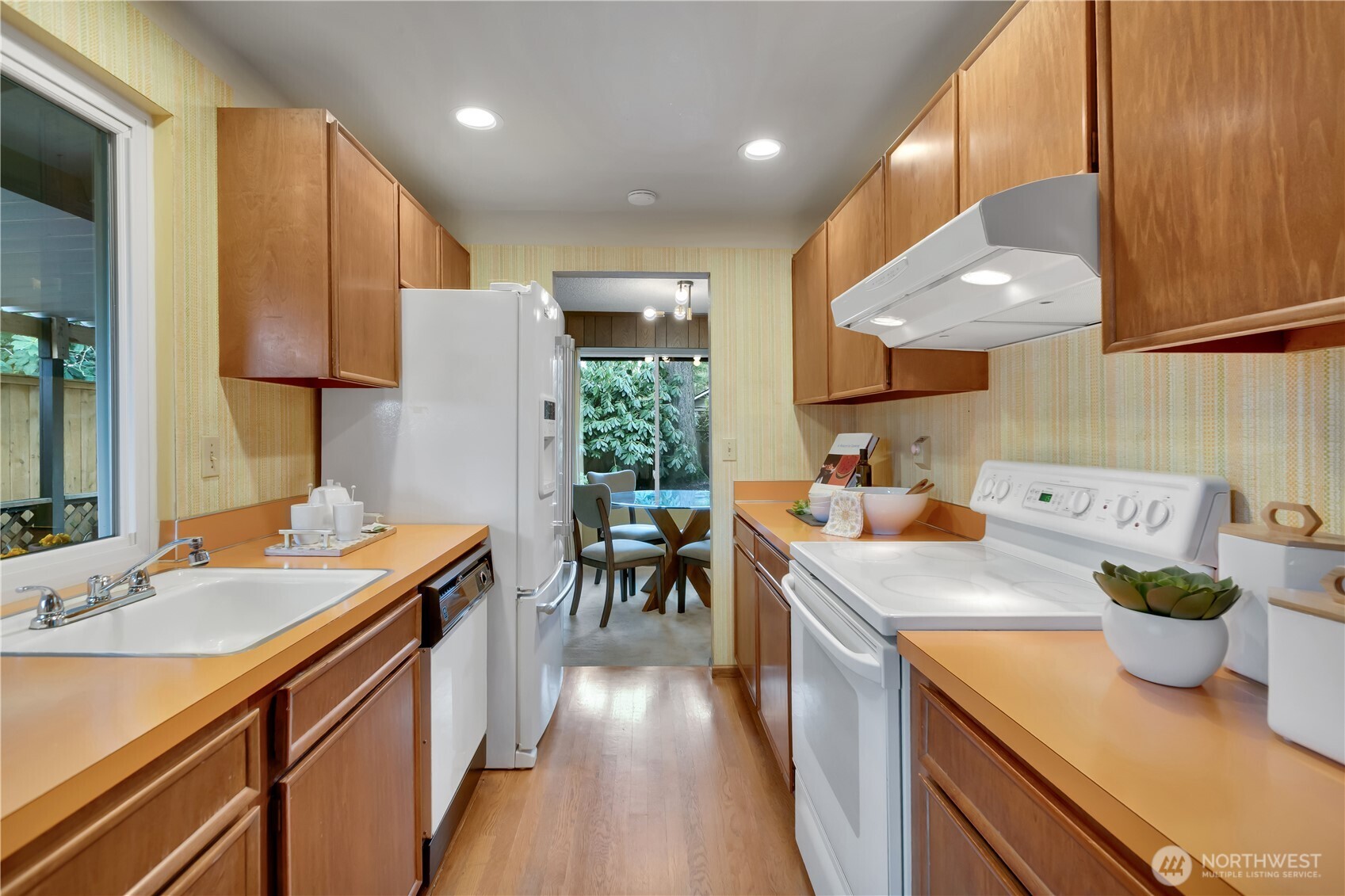 2005 Camas Court Southeast Renton, WA 98055 - Photo 8 of 31 a kitchen with a sink and cabinets