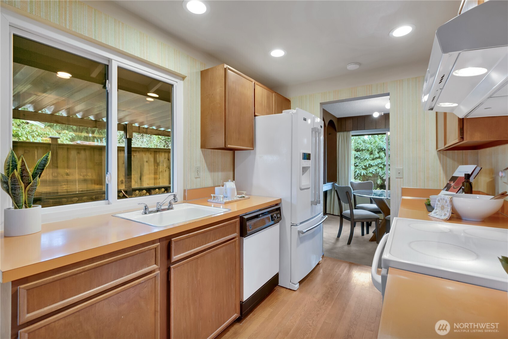 2005 Camas Court Southeast Renton, WA 98055 - Photo 10 of 31 a living room with furniture and large windows