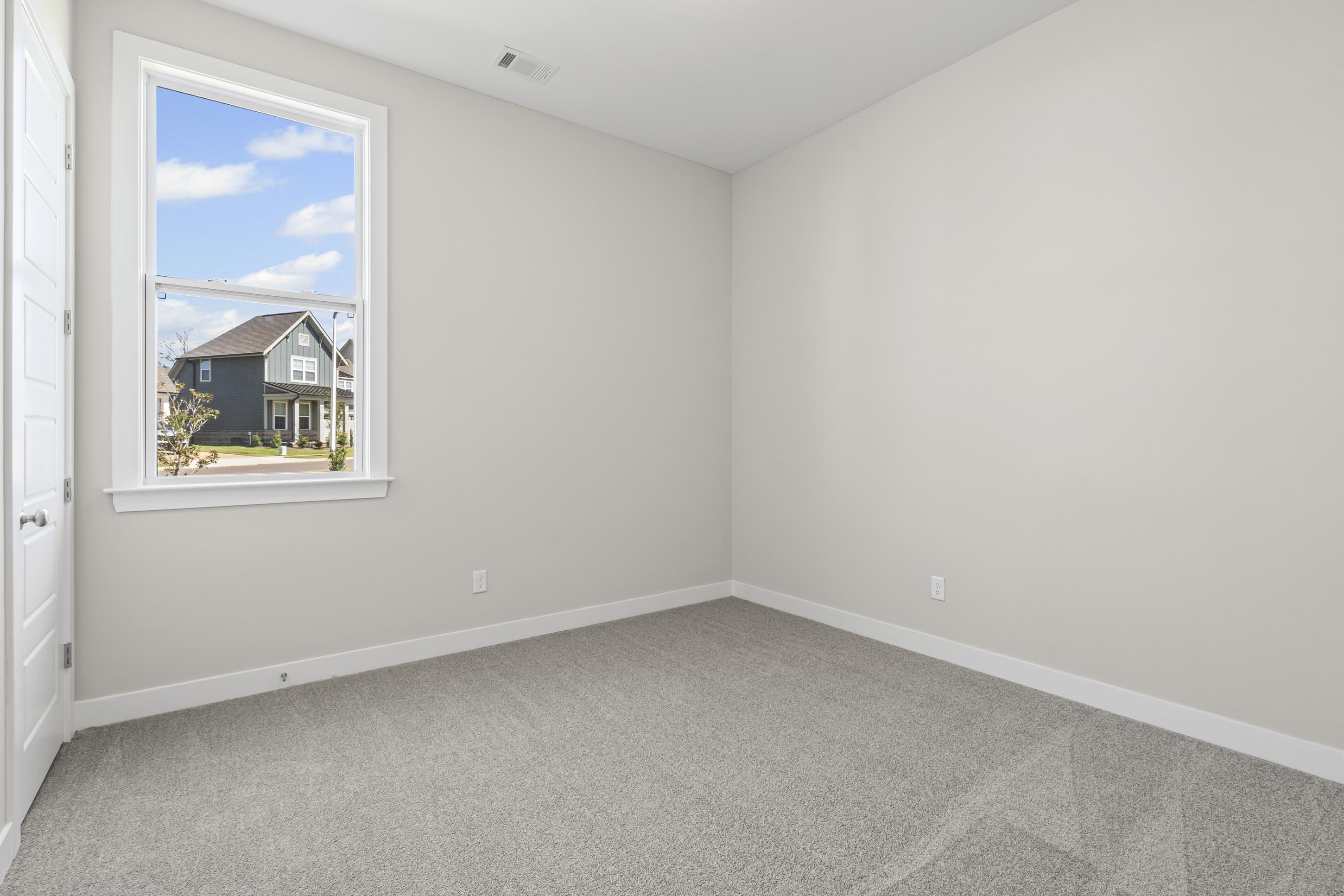 4824 Lyla Lane Collierville, TN 38017 - Photo 13 of 32 an empty room with a window
