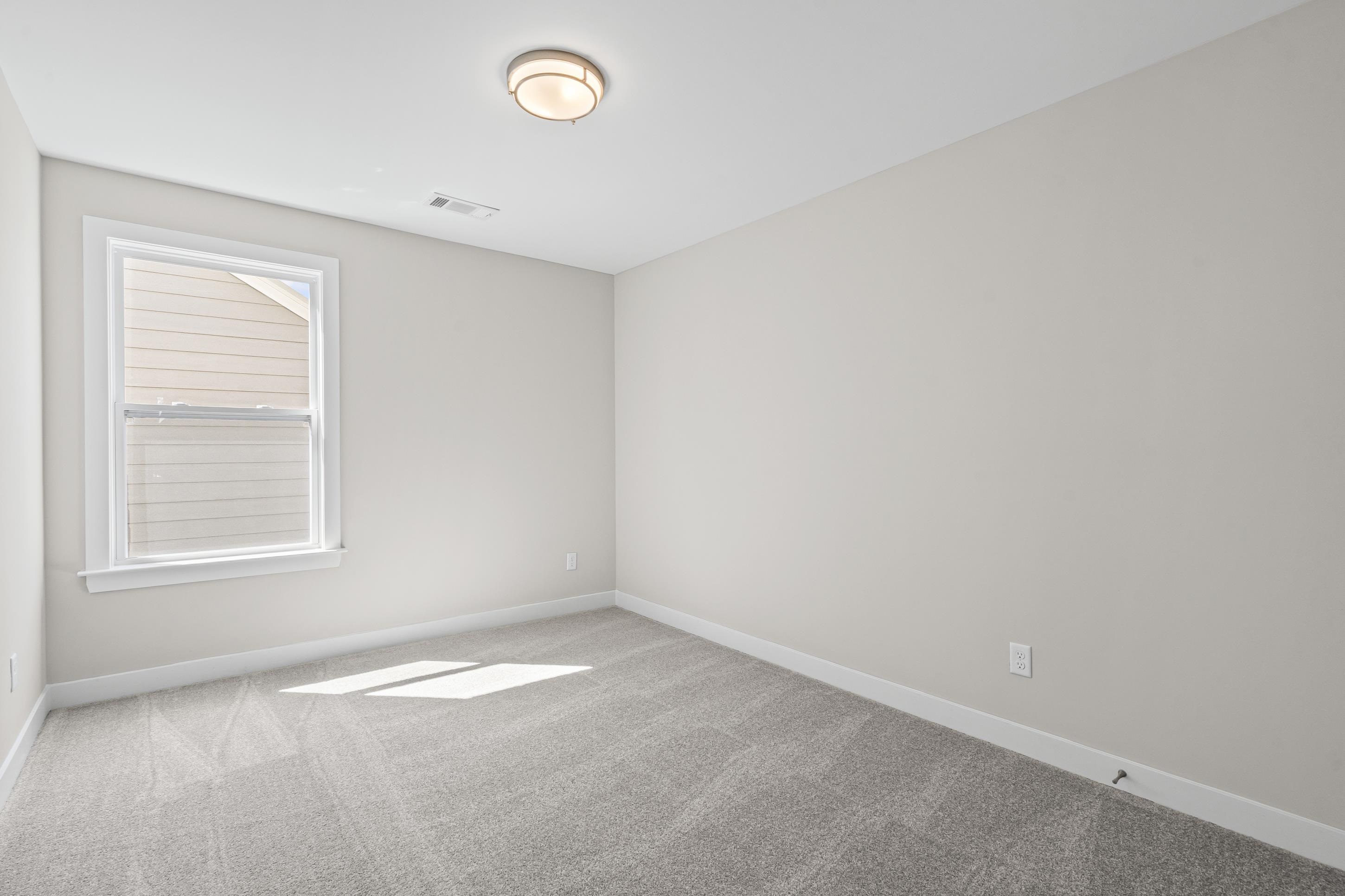 4824 Lyla Lane Collierville, TN 38017 - Photo 27 of 32 an empty room with a window