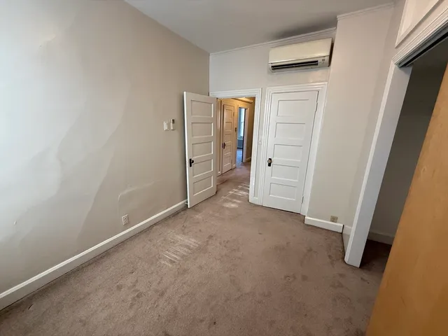 an empty room with closet