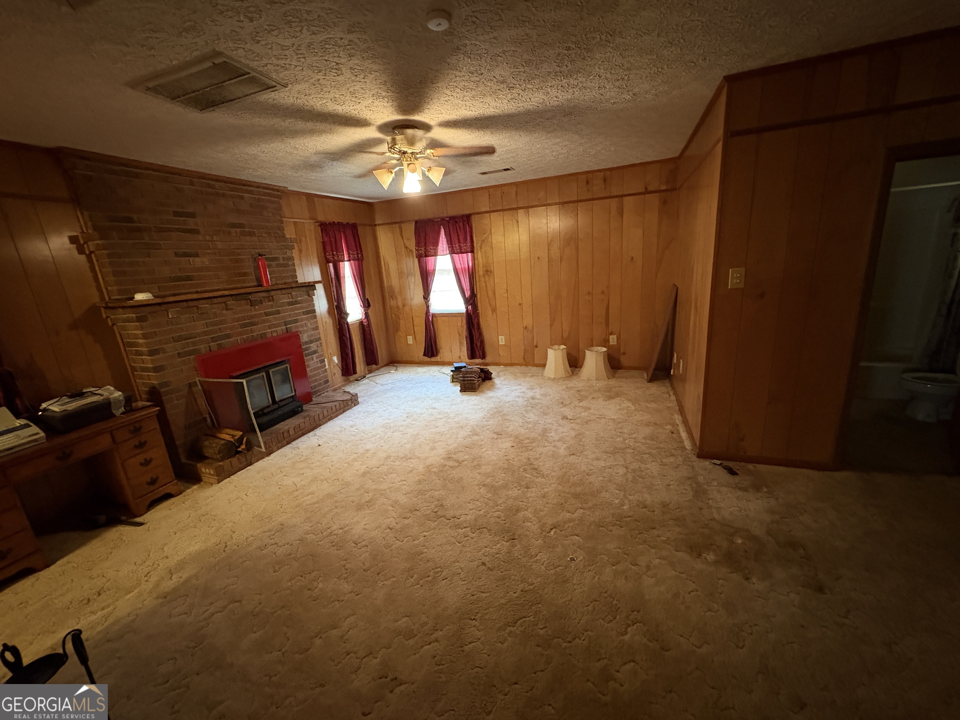 5735 Fitzgerald Street Eastman, GA 31023 - Photo 11 of 22 a view of a room with large windows
