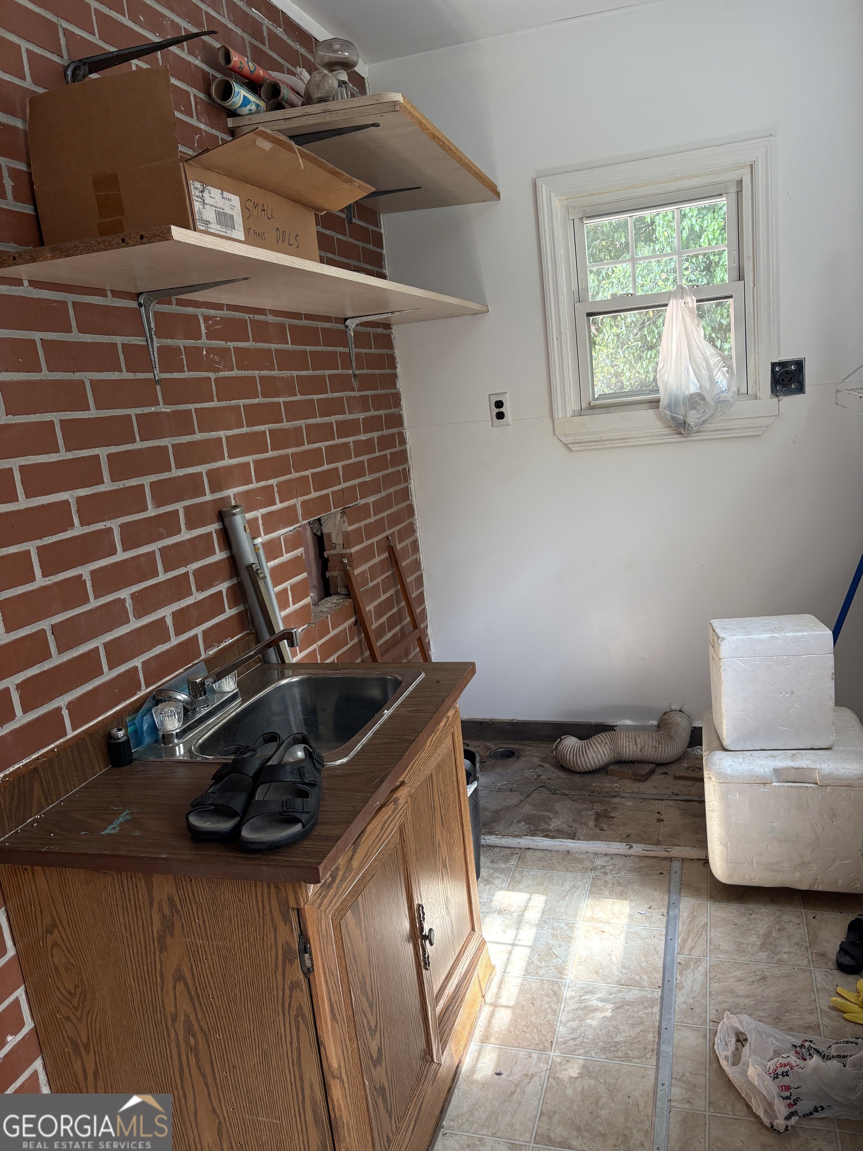 5735 Fitzgerald Street Eastman, GA 31023 - Photo 21 of 22 a kitchen with a sink and a stove