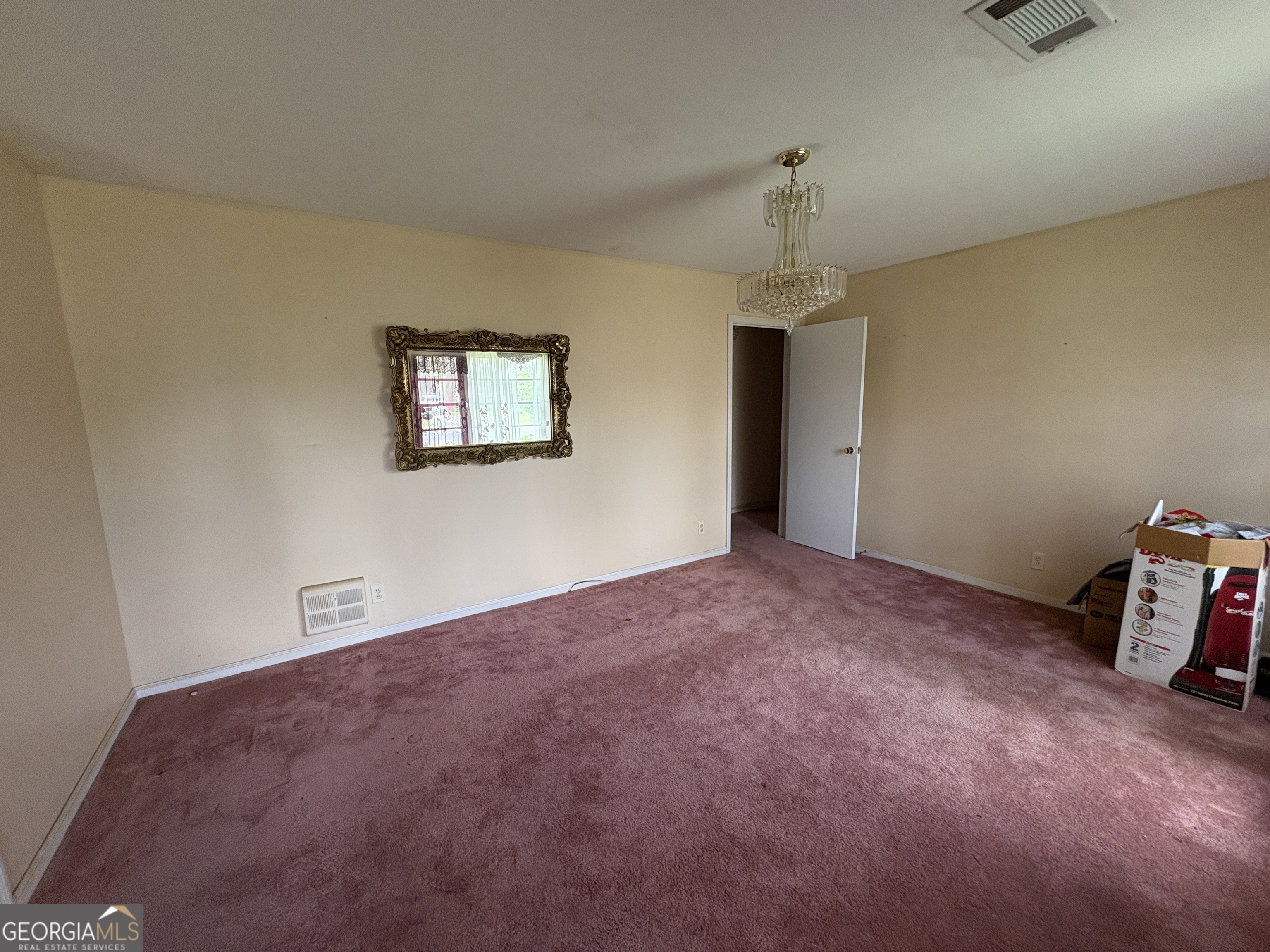 5735 Fitzgerald Street Eastman, GA 31023 - Photo 7 of 22 a view of an empty room with a window
