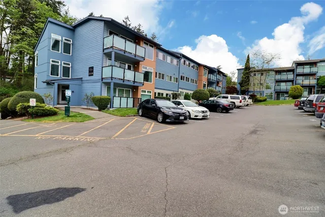 a car parked in front of a big room