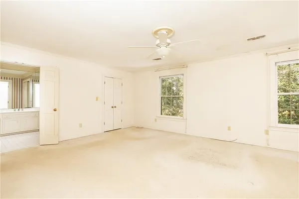 an empty room with windows