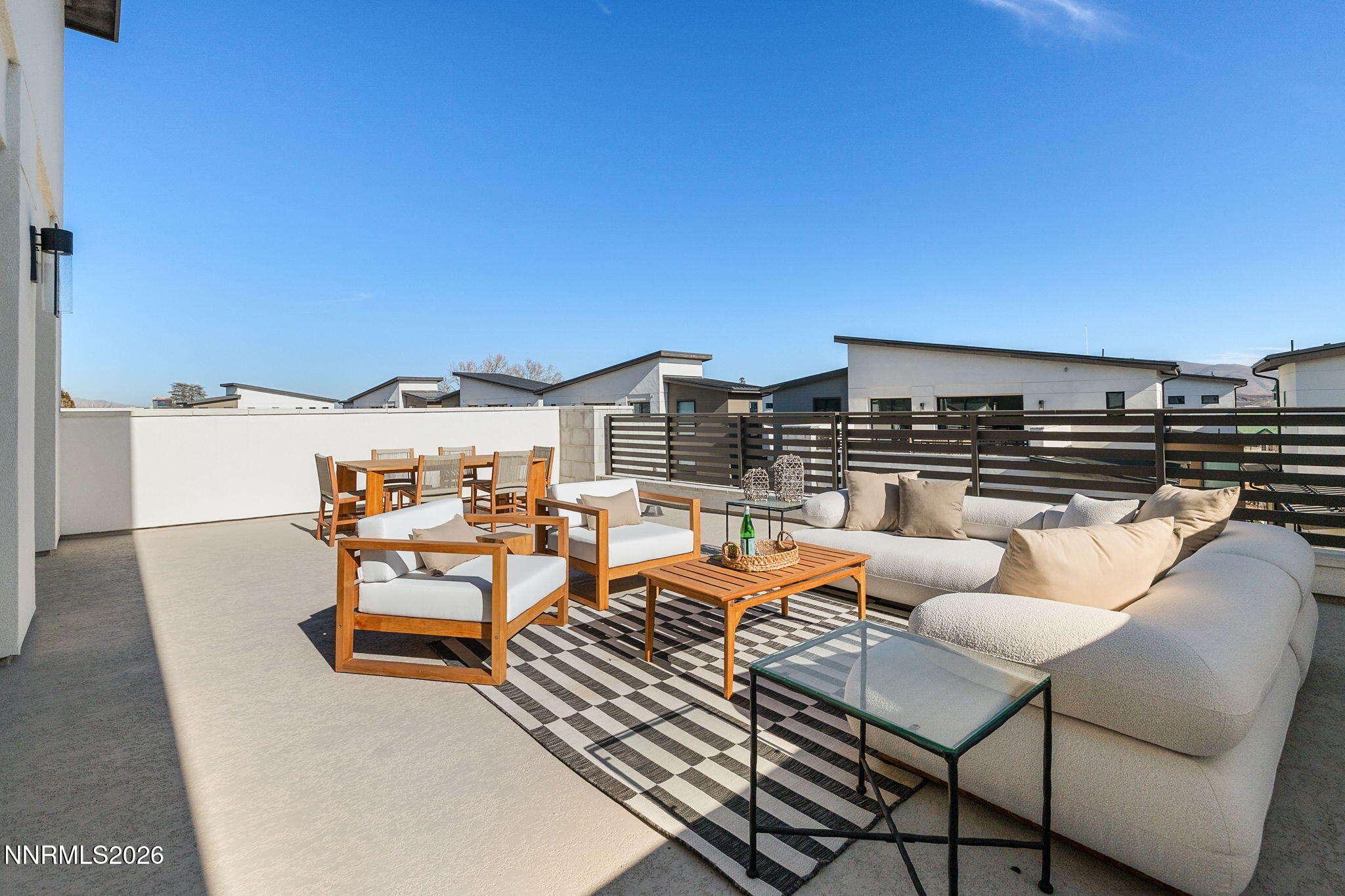 42 Campolina Street Reno, NV 89511 - Photo 44 of 52 a balcony with furniture and city view