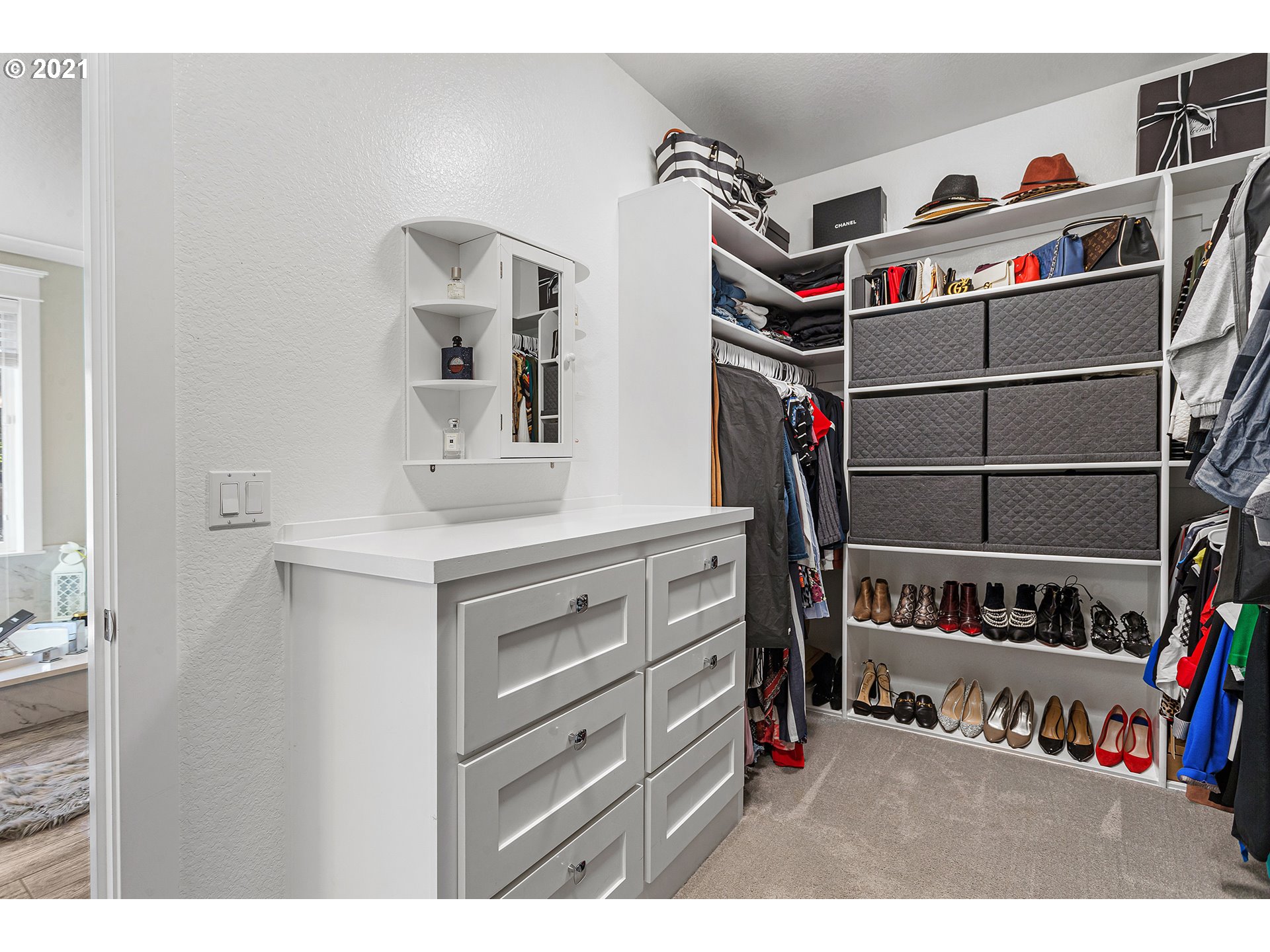 15849 South Harding Road Oregon City, OR 97045 - Photo 14 of 32 a view of walk in closet with clothes and shoes