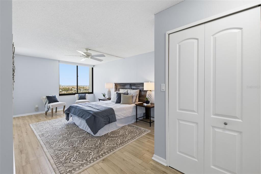 9495 Blind Pass Road, Unit 905 St. Pete Beach, FL 33706 - Photo 14 of 59 a living room with furniture and a rug