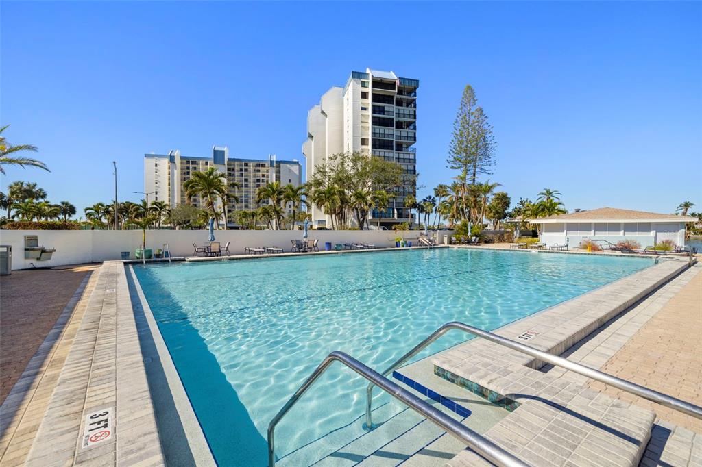9495 Blind Pass Road, Unit 905 St. Pete Beach, FL 33706 - Photo 57 of 59 a view of a city with tall buildings