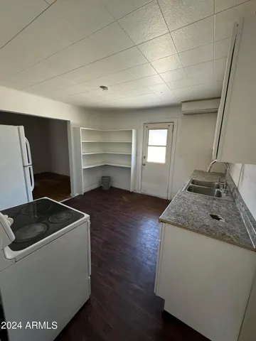 a room with chair and window