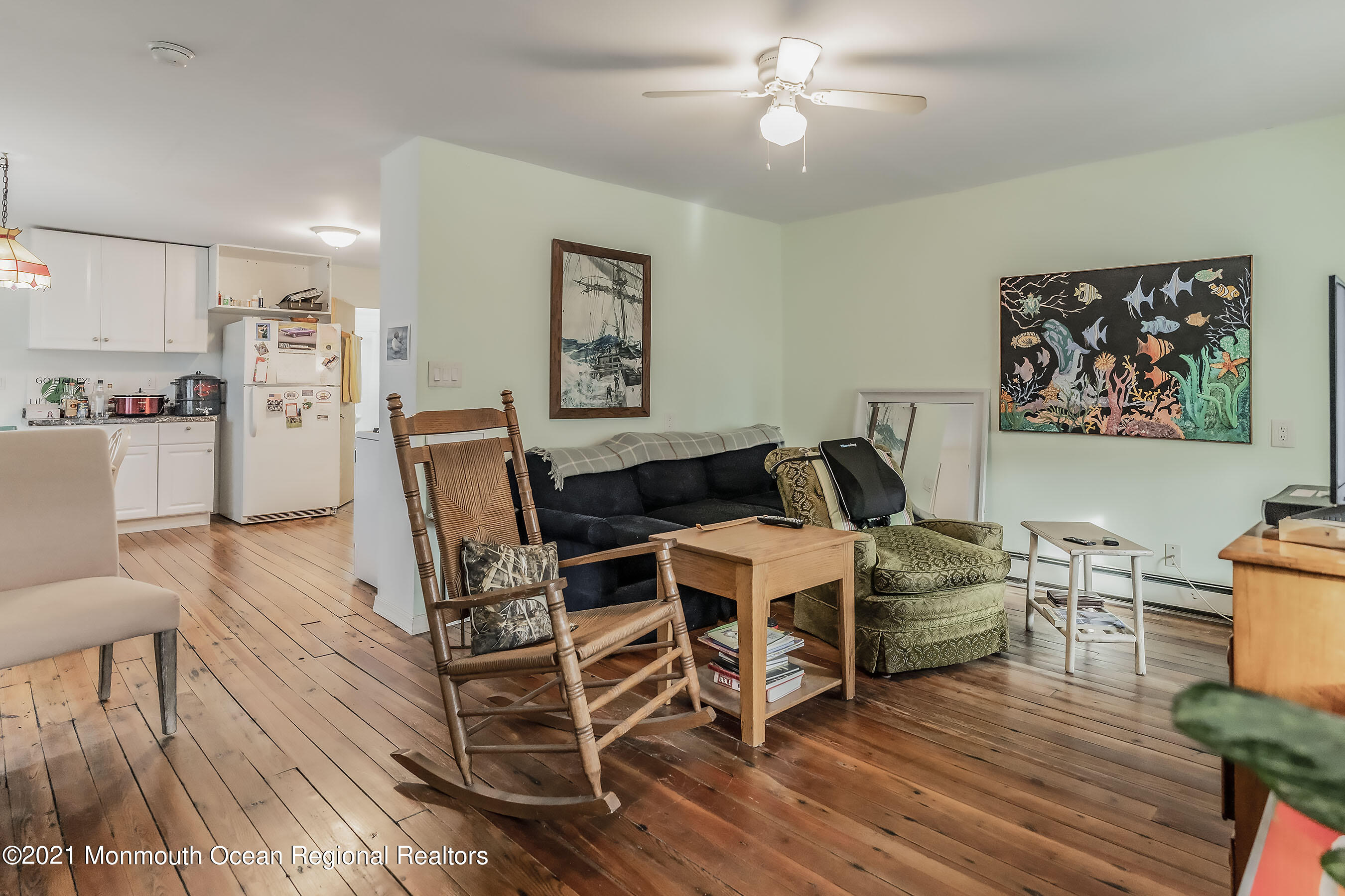 17 Center Street Sea Bright, NJ 07760 - Photo 5 of 23 a living room with fireplace furniture and a wooden floor