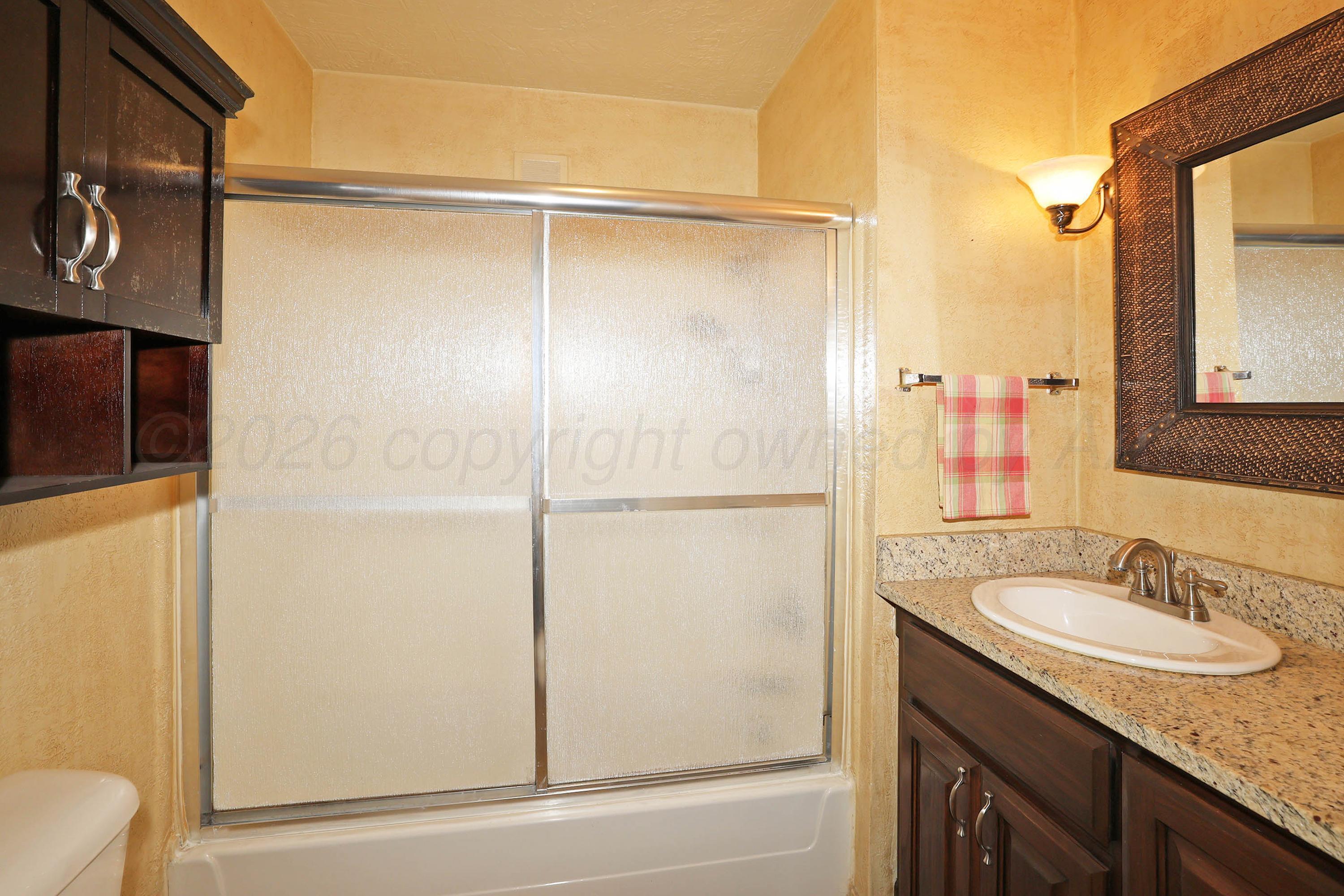 2202 South Travis Street Amarillo, TX 79109 - Photo 24 of 32 31-Bathroom by Utility