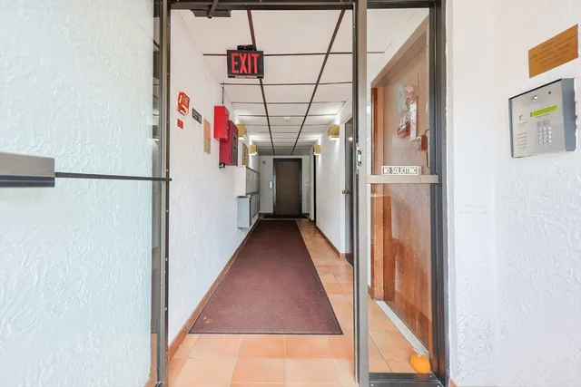 a view of a cars parked in front of a building