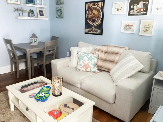 a living room with furniture and a table