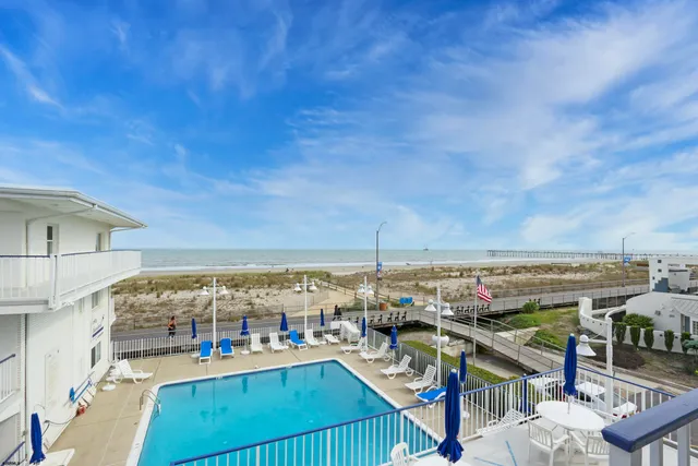 a view of a lake with a beach