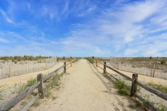 a view of a city with lawn chairs