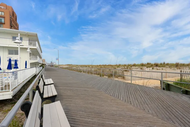 a view of a kitchen with furniture and stove
