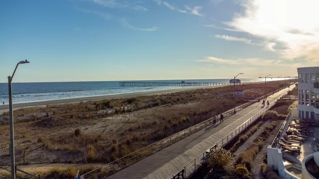 a view of a balcony with an outdoor seating