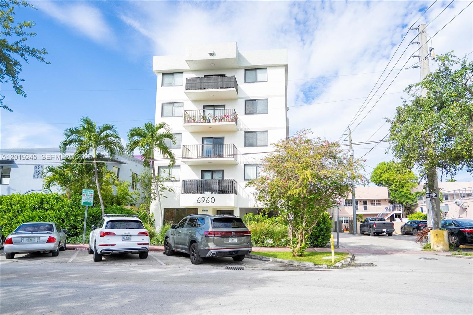 6960 Rue Vendome, Unit 201 Miami Beach, FL 33141 - Photo 20 of 27 a car parked in front of a building