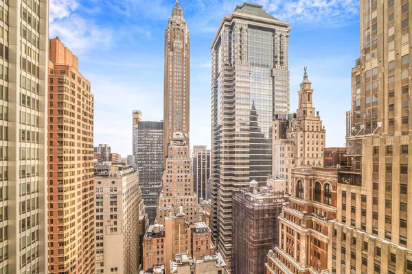 a view of a city with tall buildings