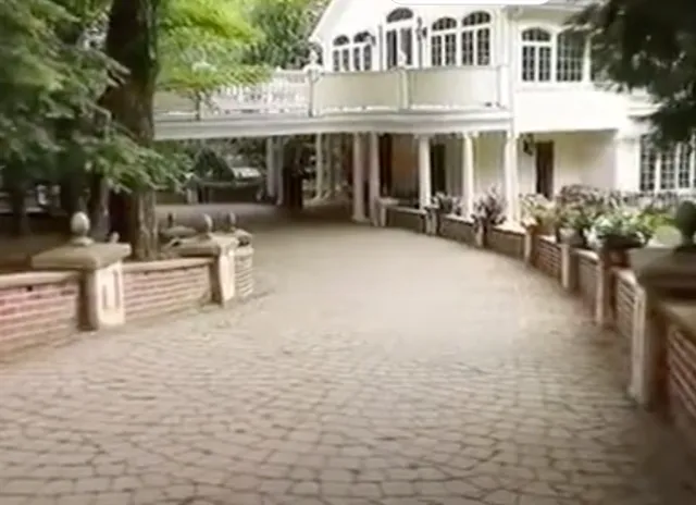 a view of a building with sitting area