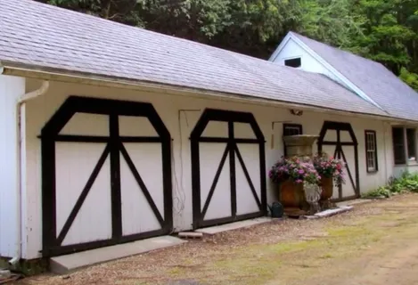 a front view of a house with swing