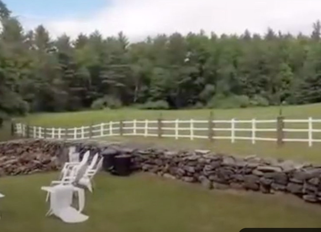 87 East Holland Road Fiskdale, MA 01518 - Photo 22 of 30 a view of a lake from a yard