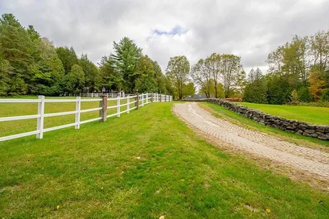 a view of a swimming pool with an outdoor space