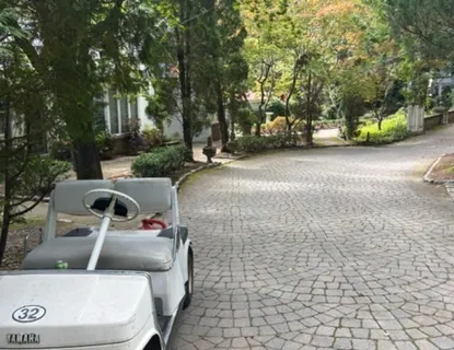 a view of backyard with seating space