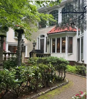 a front view of a house with porch