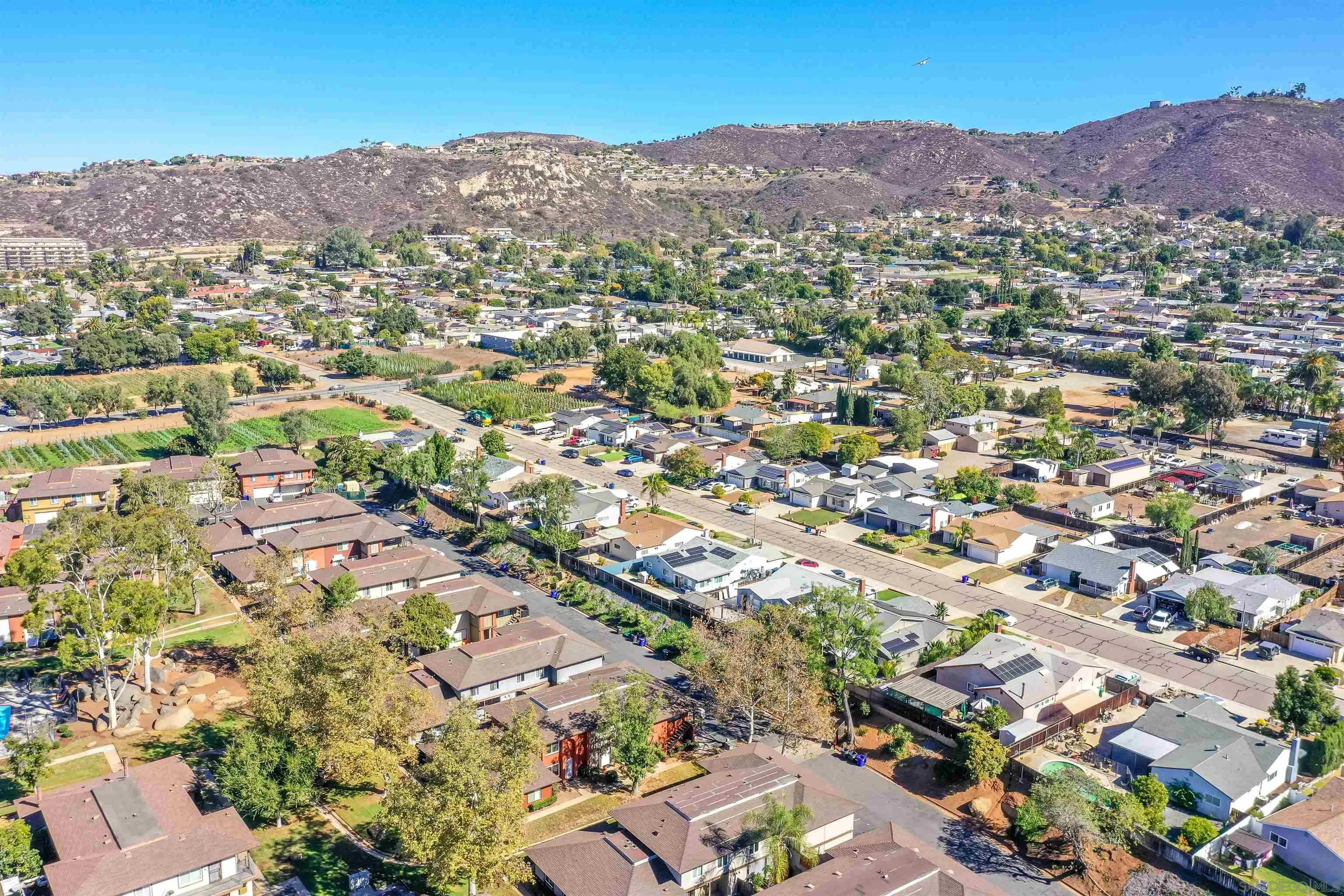 1652 Summertime Drive El Cajon, CA 92021 - Photo 22 of 23 an aerial view of residential houses with outdoor space