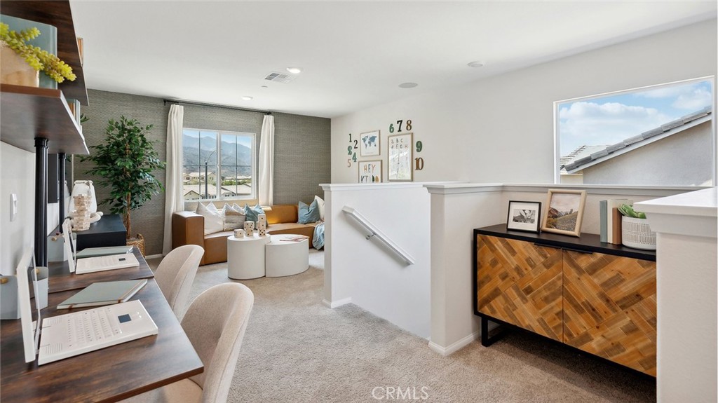 11392 Forge Road Corona, CA 92883 - Photo 15 of 24 a living room with furniture and a flat screen tv