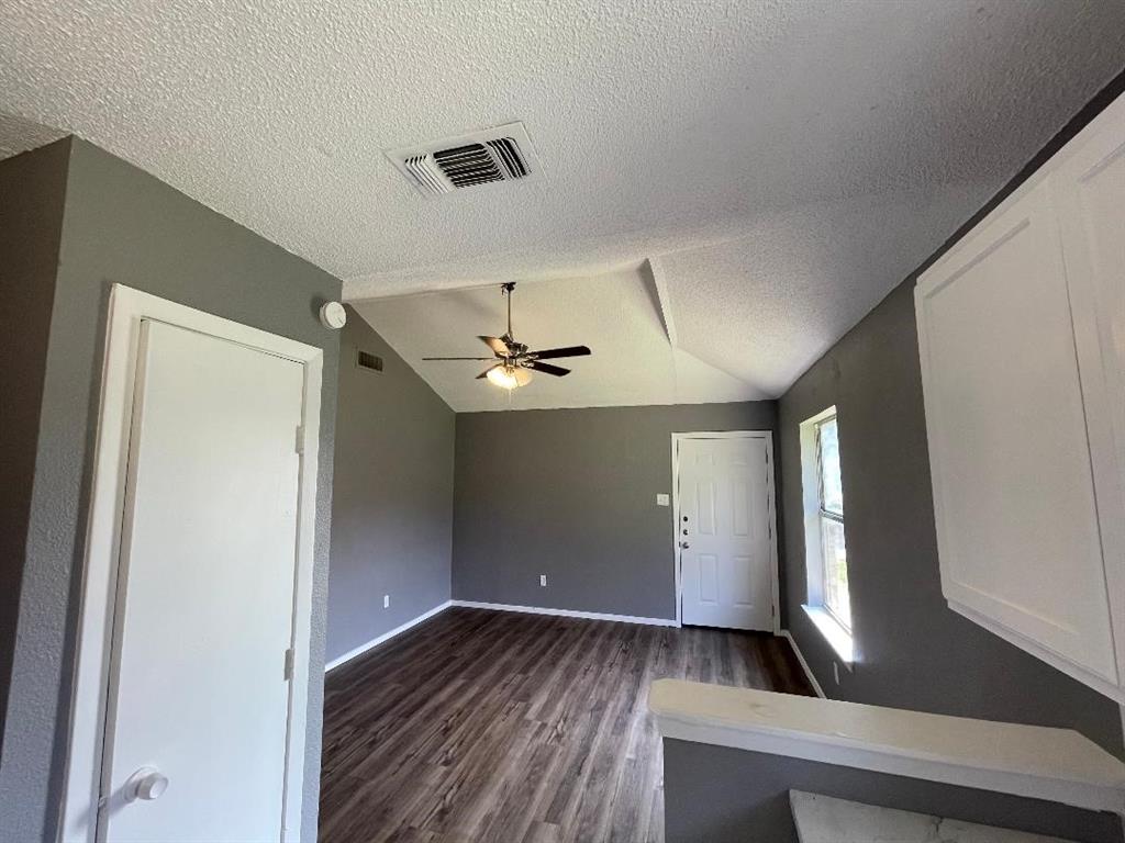 5338 Flamingo Road Fort Worth, TX 76119 - Photo 8 of 11 a view of hallway with wooden floor
