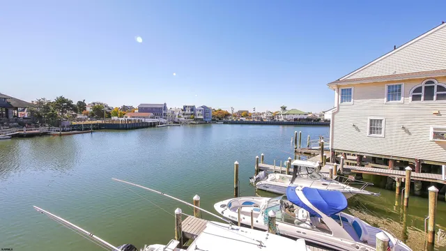 a terrace with outdoor seating and city view