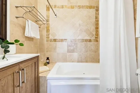 a bathroom with a sink and a bathtub