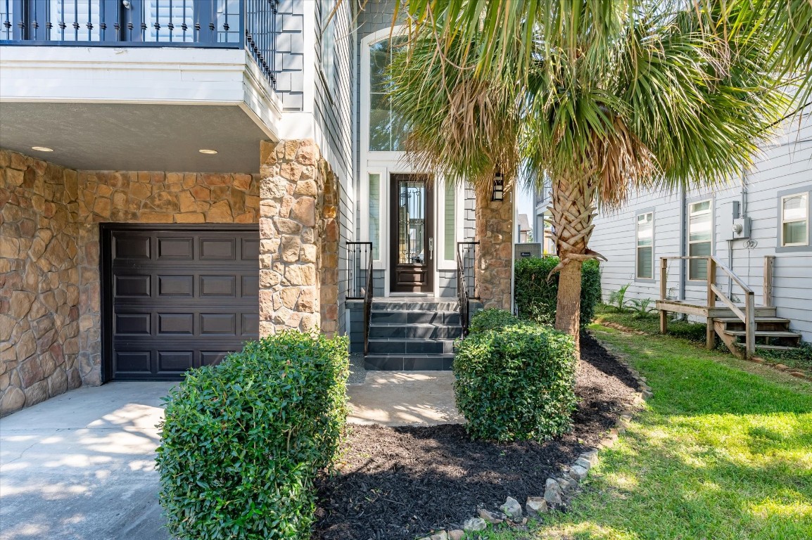 211 Valmar Street Kemah, TX 77565 - Photo 16 of 50 a front view of a house with garden